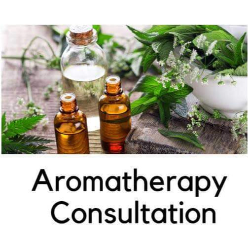 Aromatherapy consultation with essential oil bottles and fresh herbs promoting holistic well-being.