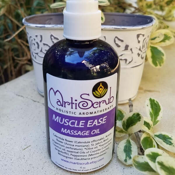 Muscle Ease Massage Oil bottle with natural ingredients for muscle and joint relief in a serene botanical setting.