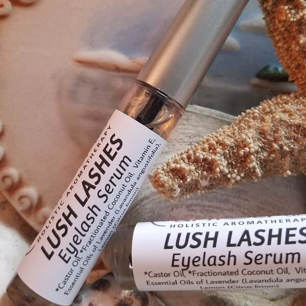 Lush Lashes Eyelash Serum bottle featuring natural ingredients for healthy lashes, placed on a textured background.