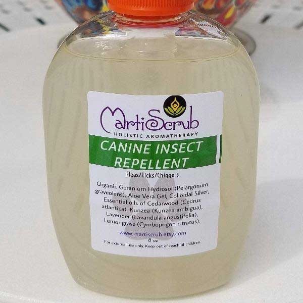 Canine insect repellent in bottle, featuring essential oils of Cedarwood, Lavender, and Kunzea for flea and tick prevention.
